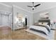 Main bedroom with large bed, ample natural light, and stylish decor at 638 Limona Woods Dr, Brandon, FL 33510