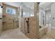 Large walk-in shower with multiple shower heads and glass enclosure at 638 Limona Woods Dr, Brandon, FL 33510