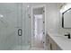 Elegant bathroom with marble shower and contemporary vanity at 638 Limona Woods Dr, Brandon, FL 33510