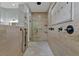 Spa-like shower with multiple shower heads and a built-in bench at 638 Limona Woods Dr, Brandon, FL 33510