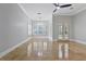 Bright dining room with tile floors, large windows, and french doors leading outside at 638 Limona Woods Dr, Brandon, FL 33510
