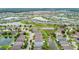 Expansive aerial view showcases the neighborhood's layout, lakes, and community feel at 6843 Boulder Run Loop, Wesley Chapel, FL 33545