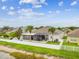Aerial view highlighting a large fenced yard with a screened-in lanai, offering a private and enjoyable outdoor space at 6843 Boulder Run Loop, Wesley Chapel, FL 33545
