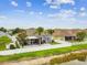 Ariel view of the home and fenced yard with a screened-in lanai, perfect for outdoor living and entertaining at 6843 Boulder Run Loop, Wesley Chapel, FL 33545
