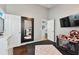 View of a bedroom featuring play appliances, and a baby playpen at 6843 Boulder Run Loop, Wesley Chapel, FL 33545