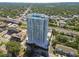 Aerial view of a highrise building near a highway at 2910 W Barcelona St # 802, Tampa, FL 33629