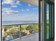 Stunning balcony view overlooking the water and cityscape at 2910 W Barcelona St # 802, Tampa, FL 33629