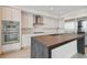 Modern kitchen with stainless steel appliances and a large island at 2910 W Barcelona St # 802, Tampa, FL 33629