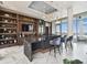 Modern bar with dark countertops and blue velvet barstools at 2910 W Barcelona St # 802, Tampa, FL 33629