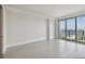 Bright bedroom with large windows and water views at 2910 W Barcelona St # 802, Tampa, FL 33629