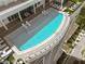 Rooftop pool with plenty of lounge chairs and city views at 2910 W Barcelona St # 802, Tampa, FL 33629
