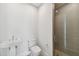 Simple bathroom with pedestal sink and shower at 2910 W Barcelona St # 802, Tampa, FL 33629
