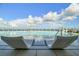 Relaxing pool with lounge chairs and city views at 2910 W Barcelona St # 802, Tampa, FL 33629