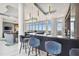 Modern bar with dark counter and blue velvet barstools at 2910 W Barcelona St # 802, Tampa, FL 33629