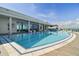 Resort-style rooftop pool with lounge chairs and city views at 2910 W Barcelona St # 802, Tampa, FL 33629
