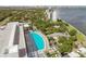 Aerial view of a rooftop pool with city views in the background at 2910 W Barcelona St # 802, Tampa, FL 33629