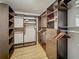 Large walk-in closet with ample shelving and hanging space at 13336 Great Plains Dr, Riverview, FL 33579
