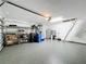 Garage with attic access and plenty of storage at 13336 Great Plains Dr, Riverview, FL 33579