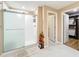 Bathroom with walk-in shower and access to closets at 13336 Great Plains Dr, Riverview, FL 33579