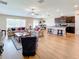 Open floor plan features a spacious living room and modern kitchen at 13336 Great Plains Dr, Riverview, FL 33579