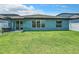 House with a large backyard and privacy fence at 13336 Great Plains Dr, Riverview, FL 33579