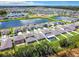 Aerial view of a neighborhood with houses and lakes at 13336 Great Plains Dr, Riverview, FL 33579
