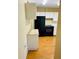 Kitchen with black appliances and white cabinets at 1655 S Highland Ave # F133, Clearwater, FL 33756