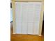 White, bi-fold pantry doors at 1655 S Highland Ave # F133, Clearwater, FL 33756
