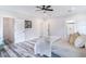 Primary bedroom with wood-look floors, and ensuite bathroom access at 18390 Fremont Ave, Port Charlotte, FL 33954