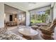 Bright Florida room with access to a bedroom and backyard view at 3332 Scorecard Dr, New Port Richey, FL 34655