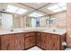 Bathroom with double vanity and shower at 3332 Scorecard Dr, New Port Richey, FL 34655