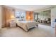 Bedroom with a queen-size bed and sliding glass doors to patio at 3332 Scorecard Dr, New Port Richey, FL 34655