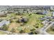 Aerial view of golf course and surrounding area at 3332 Scorecard Dr, New Port Richey, FL 34655