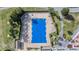 Community pool with blue cover at 3332 Scorecard Dr, New Port Richey, FL 34655