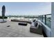 Relaxing outdoor patio with curved sectional sofa at 5120 Marina Way # 8805, Tampa, FL 33611