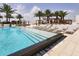Resort-style pool with ample lounge chairs and cabanas at 5120 Marina Way # 8805, Tampa, FL 33611