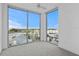 Bedroom with expansive windows offering scenic city views at 5120 Marina Way # 8805, Tampa, FL 33611
