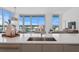 Modern kitchen with white quartz countertops and stainless steel sink at 5120 Marina Way # 8805, Tampa, FL 33611