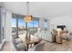 Elegant dining area with a wood table and city views at 5120 Marina Way # 8805, Tampa, FL 33611