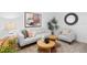 Comfortable living room with a light grey sofa and accent chairs at 5120 Marina Way # 8805, Tampa, FL 33611