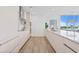 Modern kitchen with stainless steel appliances and island at 5120 Marina Way # 8805, Tampa, FL 33611