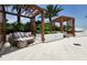 Relaxing lounge area with pergola and comfortable seating at 5120 Marina Way # 8805, Tampa, FL 33611
