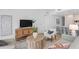 Bright living room with a neutral color palette, featuring a wooden coffee table at 5120 Marina Way # 8805, Tampa, FL 33611