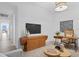 Bright home office with a wooden desk and built-in media console at 5120 Marina Way # 8805, Tampa, FL 33611