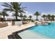 Enjoy this refreshing pool area with palm trees at 5120 Marina Way # 8805, Tampa, FL 33611