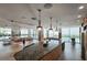 Modern common area with kitchen island and pool table at 5120 Marina Way # 8805, Tampa, FL 33611