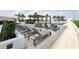 Inviting pool area with lounge chairs and pergola at 5120 Marina Way # 8805, Tampa, FL 33611