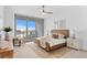 Bright bedroom with a king-size bed, city view, and ample natural light at 5120 Marina Way # 8805, Tampa, FL 33611