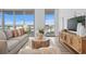 Living room with comfortable seating and city views at 5120 Marina Way # 8805, Tampa, FL 33611