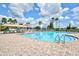Inviting community pool with a spacious deck and water features at 10906 Holly Cone Dr, Riverview, FL 33569
